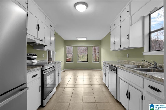 kitchen with white cabinetry, sink, and appliances with stainless steel finishes