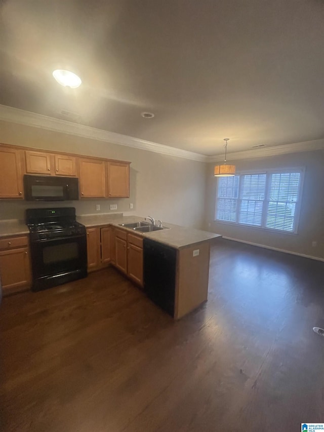 kitchen featuring dark hardwood / wood-style floors, kitchen peninsula, crown molding, pendant lighting, and black appliances