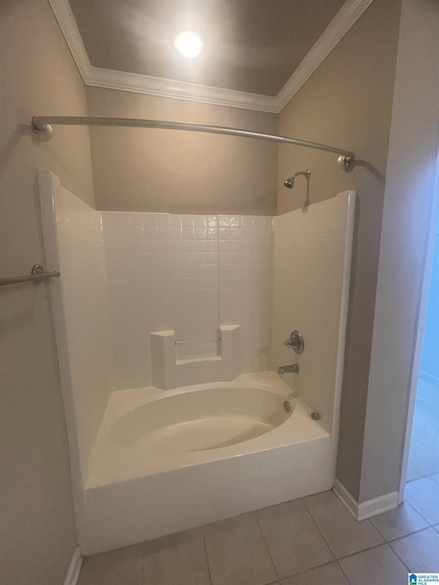 bathroom featuring tile patterned floors,  shower combination, and ornamental molding