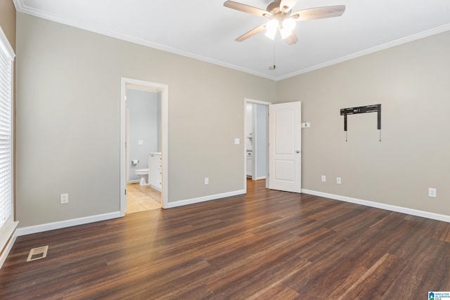 unfurnished bedroom featuring ceiling fan, connected bathroom, ornamental molding, and dark wood-type flooring