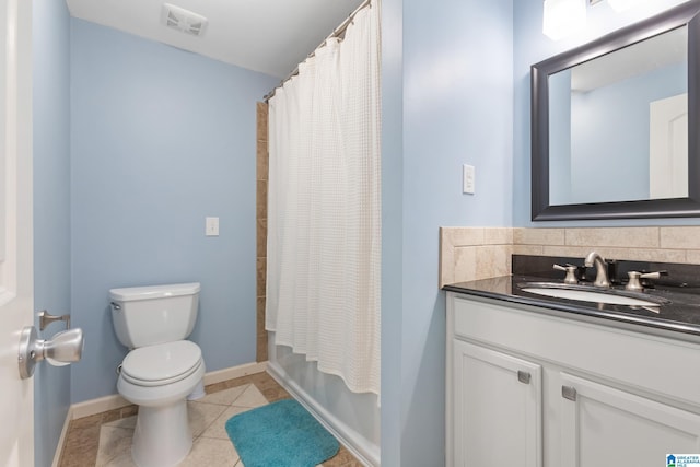 full bathroom with tile patterned floors, vanity, shower / tub combo, tasteful backsplash, and toilet