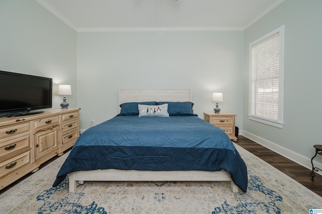 bedroom featuring crown molding and dark wood-type flooring