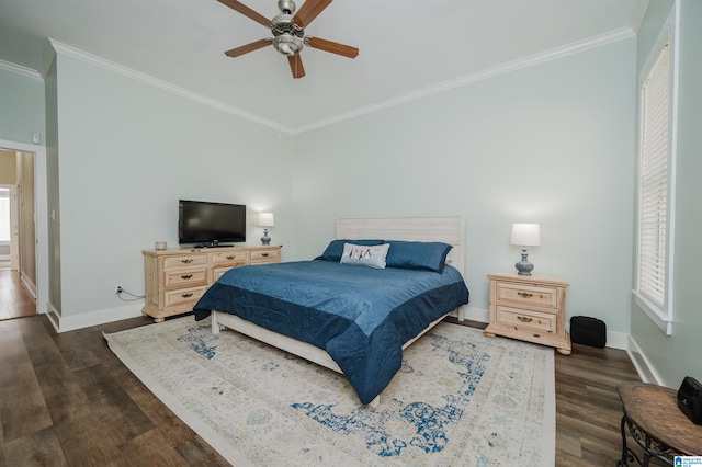 bedroom with multiple windows, ceiling fan, dark wood-type flooring, and ornamental molding