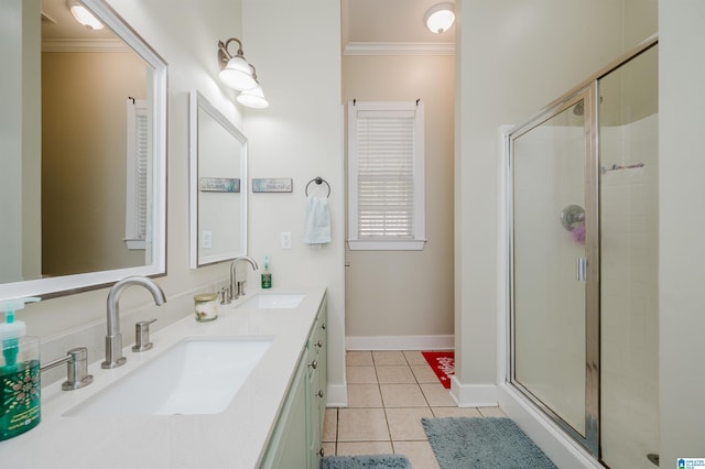 bathroom featuring tile patterned flooring, vanity, an enclosed shower, and ornamental molding