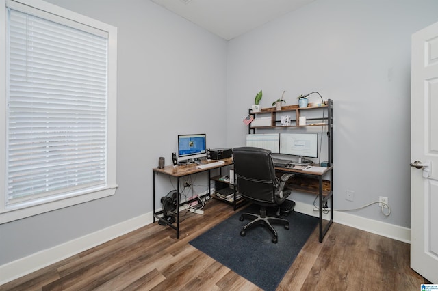 office with hardwood / wood-style flooring