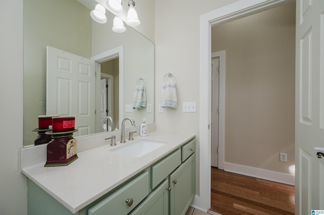 bathroom featuring vanity and hardwood / wood-style flooring