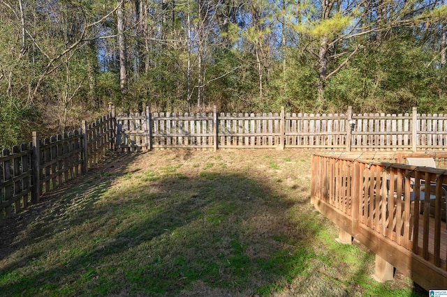 view of yard with a wooden deck