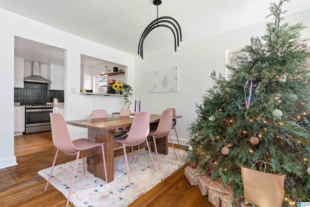 dining area with dark wood-type flooring