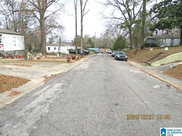 view of street with curbs