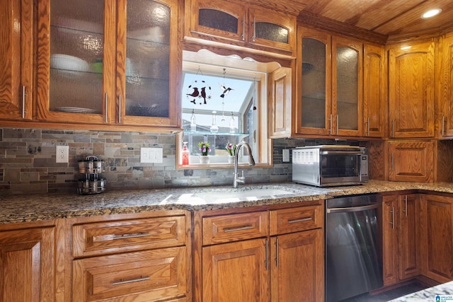 kitchen with light stone countertops, backsplash, stainless steel dishwasher, wood ceiling, and sink