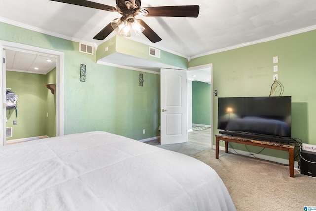 bedroom with carpet, ceiling fan, and crown molding