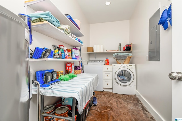 clothes washing area featuring electric panel and independent washer and dryer