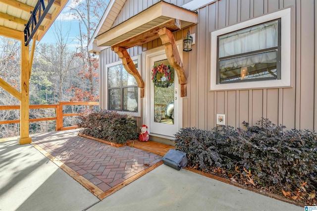 entrance to property with a patio