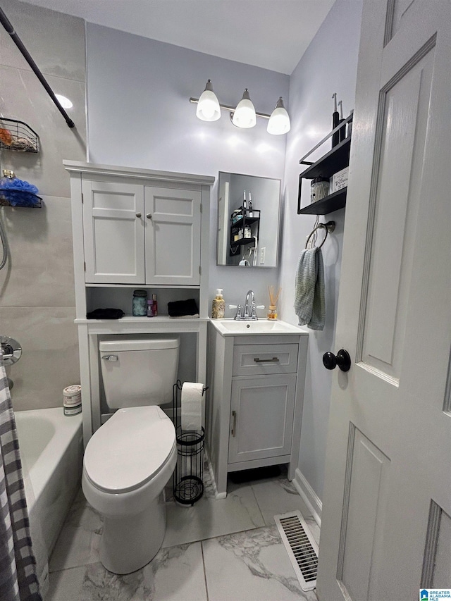 full bathroom with vanity, toilet, and shower / bath combo with shower curtain