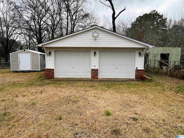 garage featuring a yard