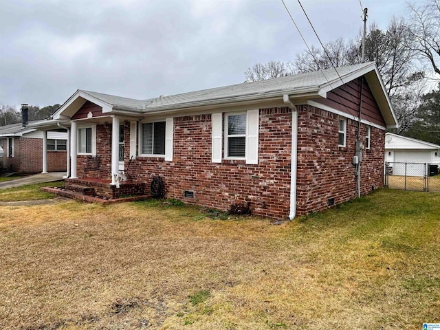 ranch-style home with a front lawn