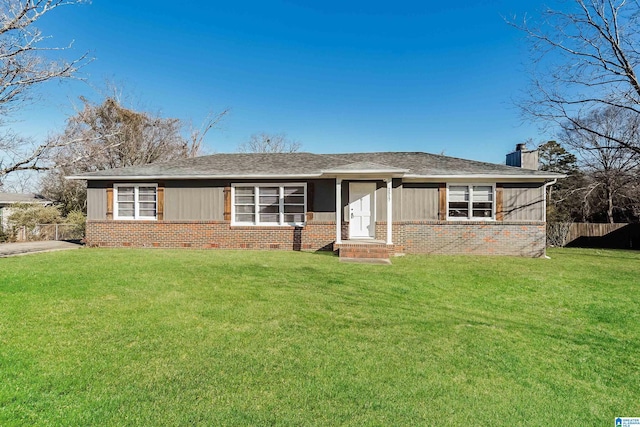 single story home featuring a front yard