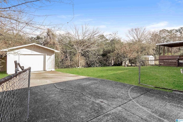 exterior space with an outbuilding and a garage