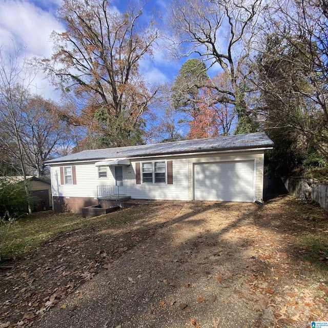 view of front of property featuring a garage