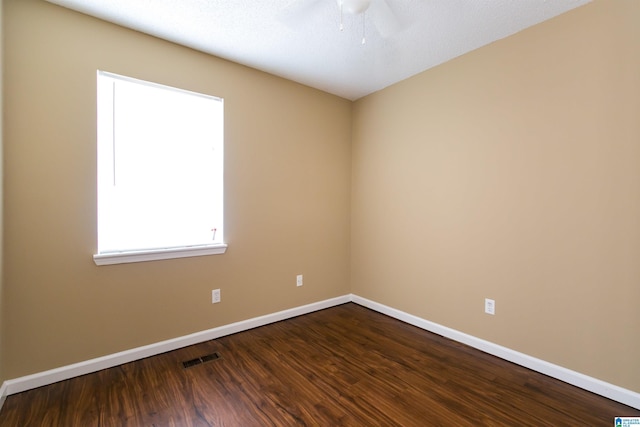 unfurnished room with hardwood / wood-style floors