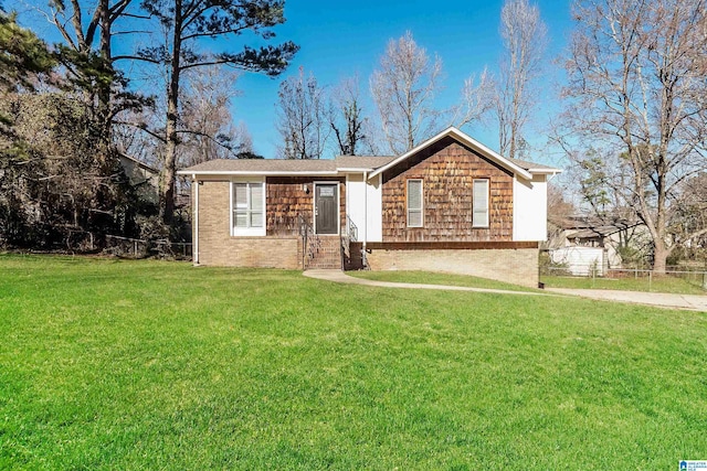 ranch-style house with a front lawn