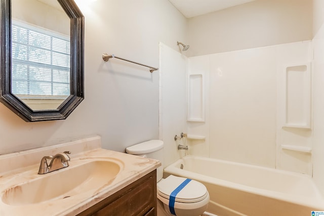 full bathroom with vanity, toilet, and bathtub / shower combination