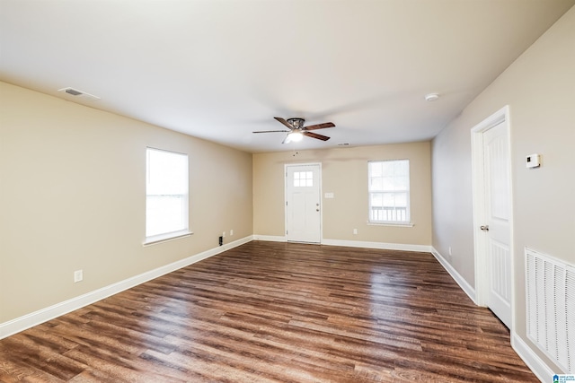 entrance foyer featuring ceiling fan and dark hardwood / wood-style floors