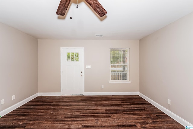 entryway with ceiling fan and dark hardwood / wood-style flooring