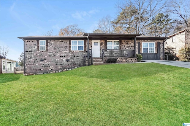 ranch-style home with a front lawn