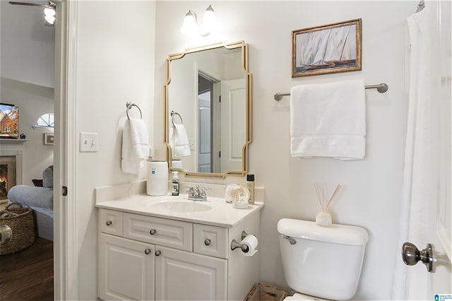 bathroom with vanity and toilet