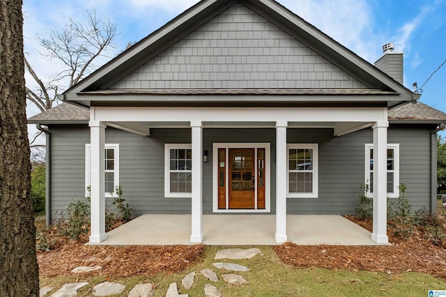 back of house with a porch