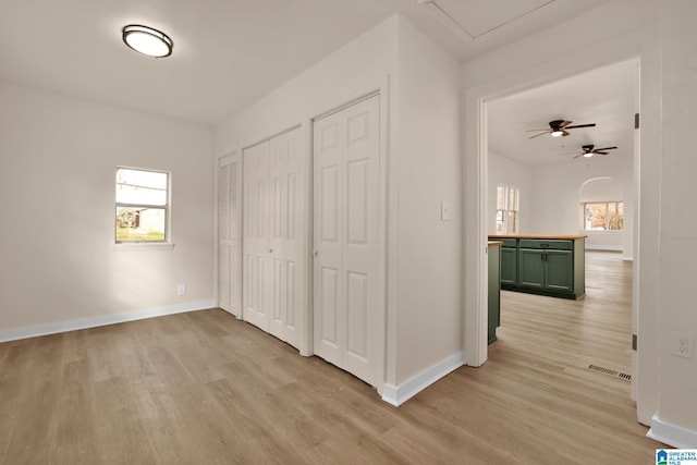 hallway featuring light hardwood / wood-style flooring