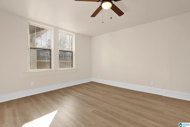 unfurnished room featuring wood-type flooring and ceiling fan