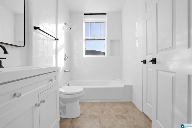 bathroom with tile patterned flooring, toilet, and tiled shower / bath