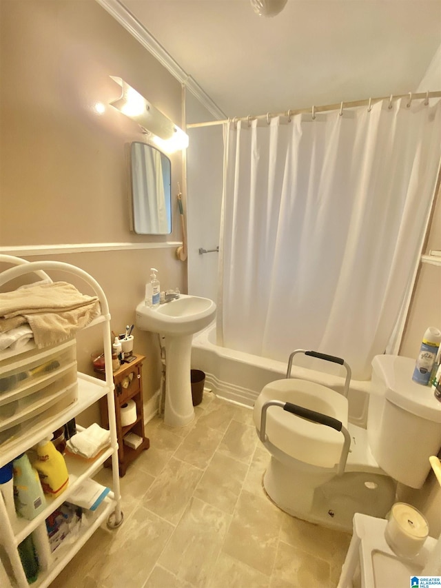 bathroom with toilet, shower / bath combination with curtain, and ornamental molding