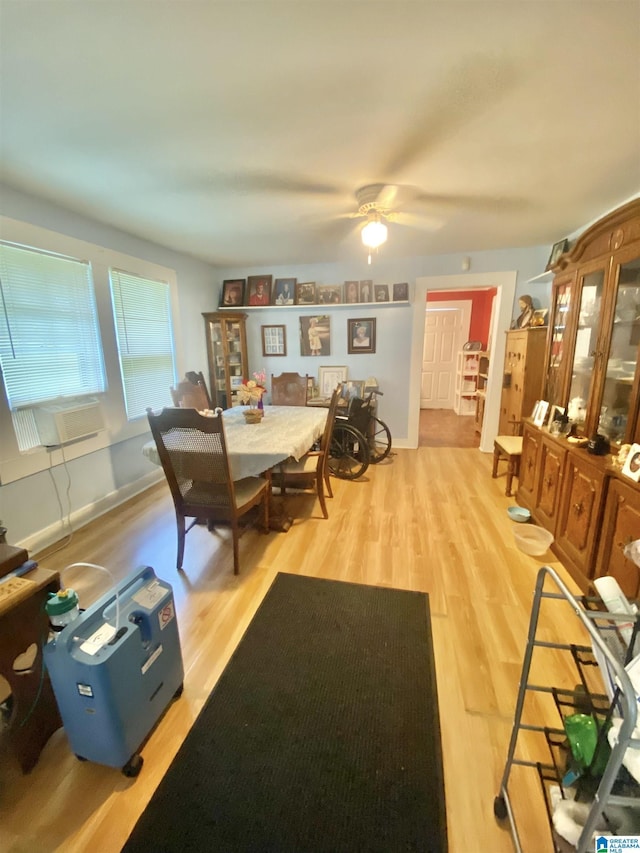 dining room featuring ceiling fan and light wood-type flooring