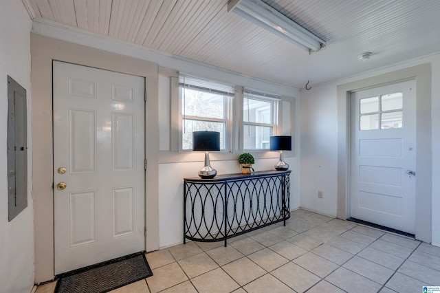 tiled entryway with crown molding