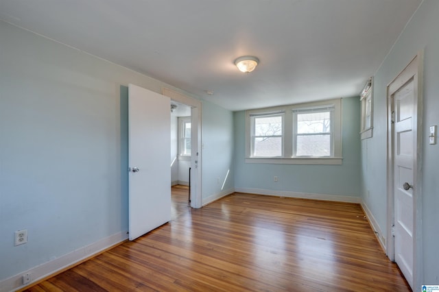 unfurnished bedroom with light hardwood / wood-style flooring