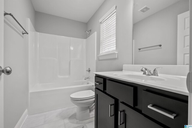 full bathroom featuring vanity, shower / bathtub combination, and toilet