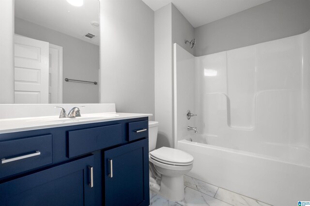 full bathroom featuring shower / bathing tub combination, vanity, and toilet