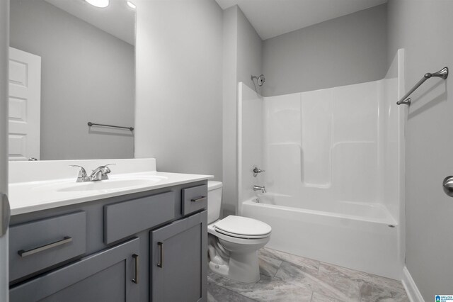 full bathroom with vanity, toilet, and shower / washtub combination