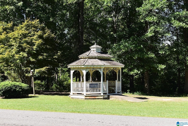 view of property's community featuring a gazebo and a lawn