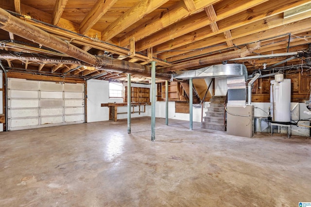 garage with heating unit and water heater