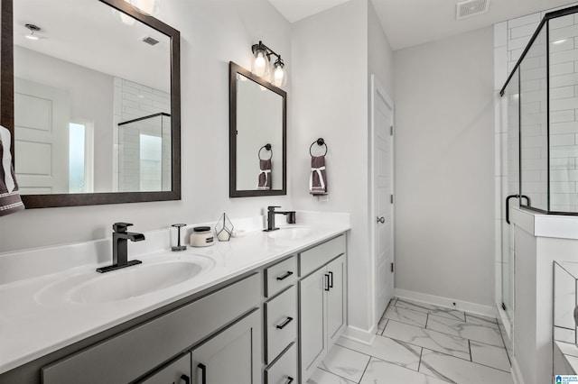 500 Avondale Ln, Pell City, AL 35128 - full bathroom featuring marble look tile flooring, double vanity, and a stall shower