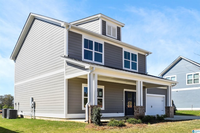 view of front of property with central AC, a porch, and a front yard