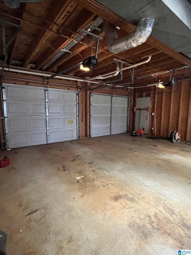 garage featuring a garage door opener