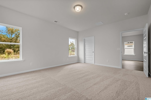 view of carpeted spare room