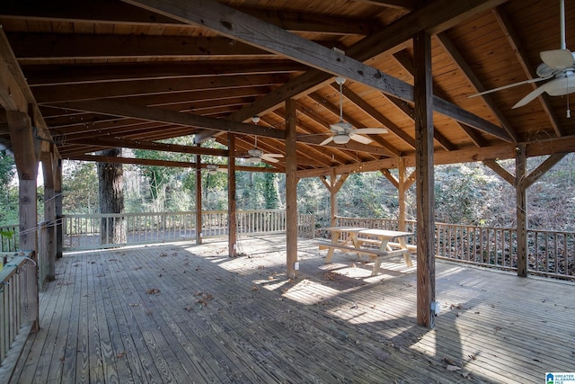 wooden deck with a gazebo and ceiling fan