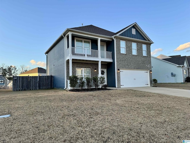 view of front of house with a balcony and a garage