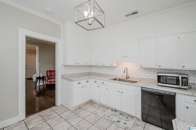 kitchen featuring dishwasher, white cabinets, light tile patterned flooring, and sink